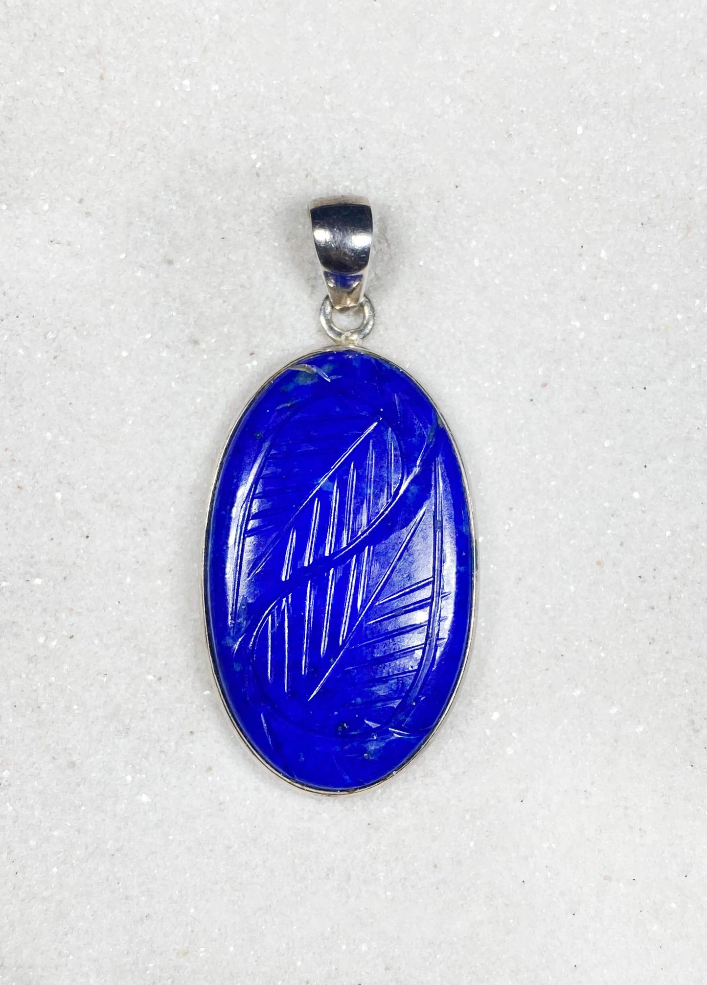 Carved Lapis Lazuli Pendant