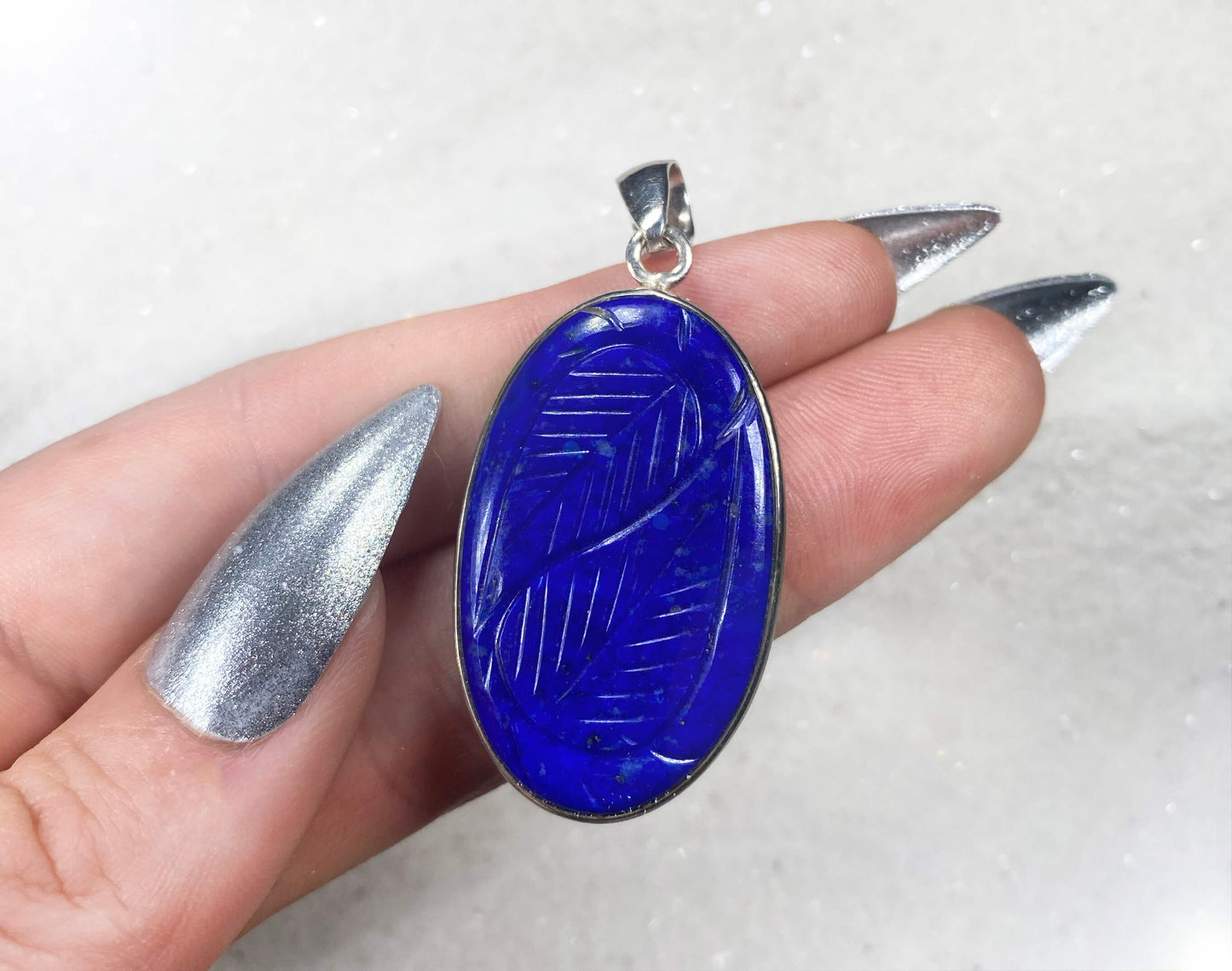 Carved Lapis Lazuli Pendant